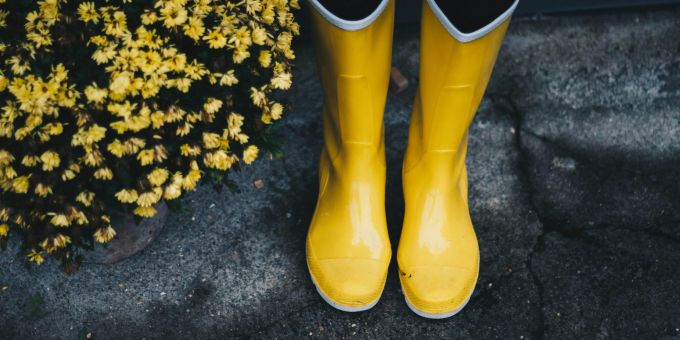 yellow rain boots and yellow flowers